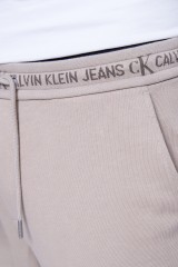 Spodnie dresowe z logo beżowe CALVIN KLEIN JEANS