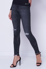 Spodnie jeansowe z przetarciami GUESS